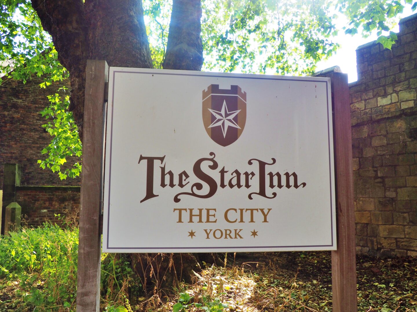 A sign which says "The Star Inn The City - York"