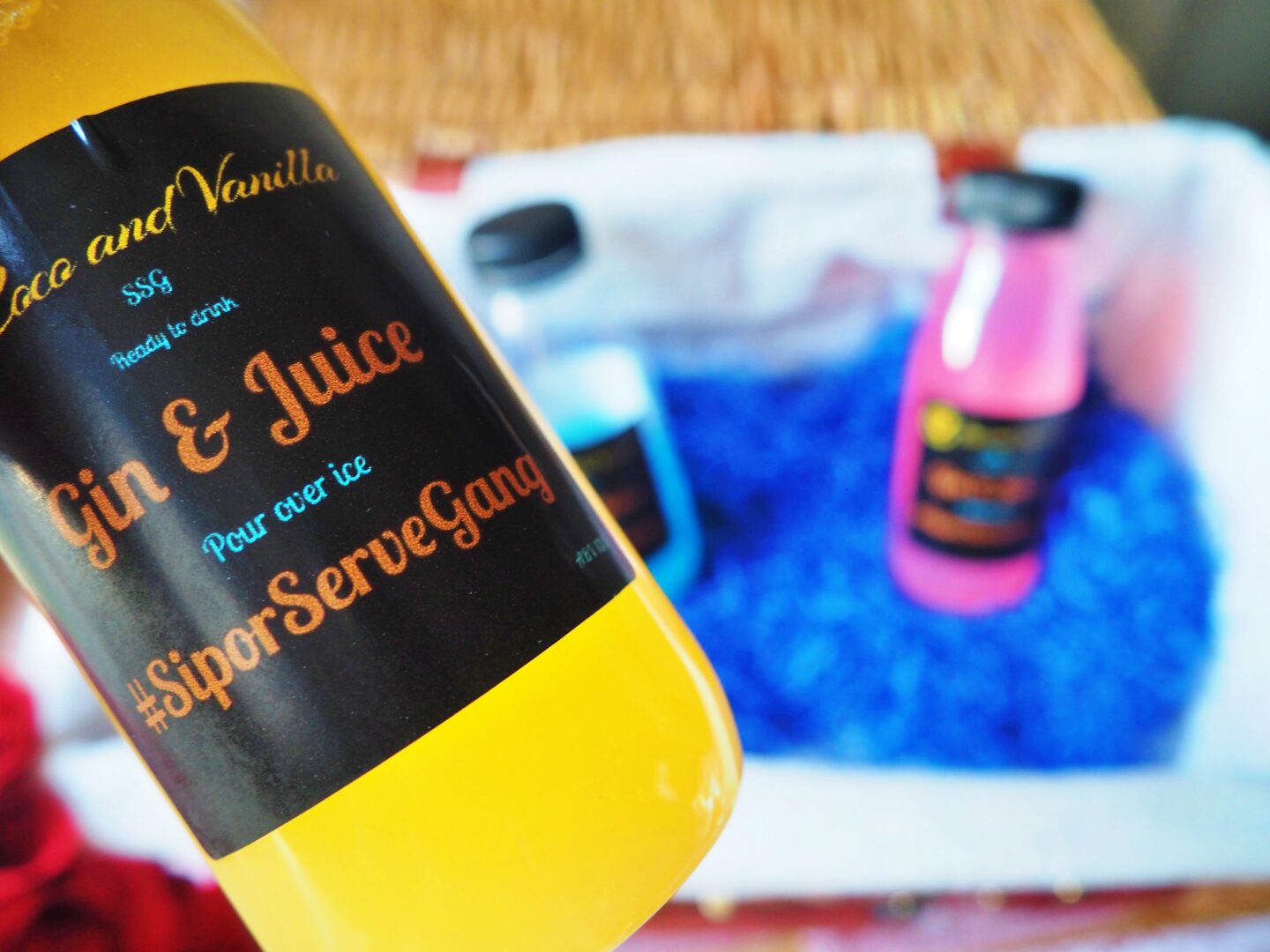Mango and passion fruit cocktail in a bottle