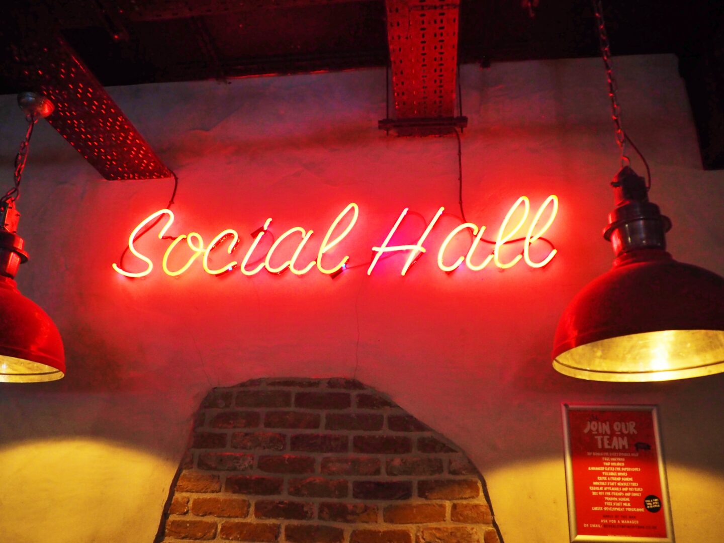 An led sign which says social hall